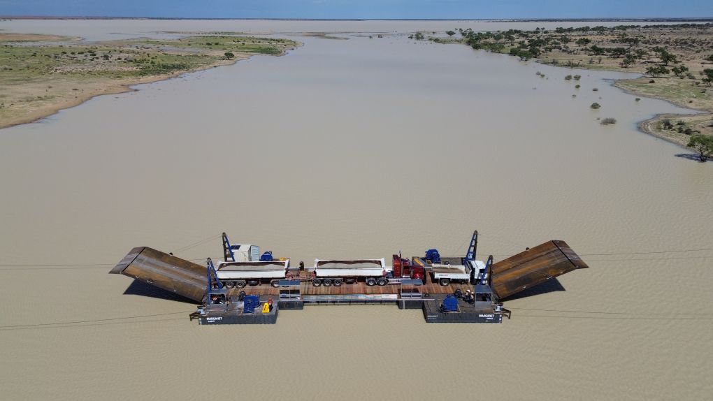 The Cooper Creek Barge in the water