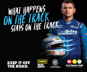 Todd Hazelwood wearing his racing livery in front of a black background. The text &quot;What happens on the track stays on the track&quot; is prominently shown.